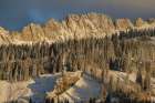 USA, Colorado, Gunnison National Forest. Snow-covered mountain and forest landscape in autumn. Art Print
